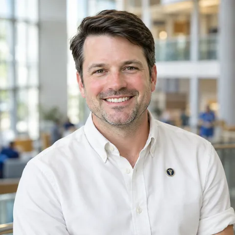 Portrait of Dr. Adam Winslow, DNP, RN
